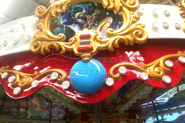 luxury decorations on the cornice of carousel ride vintage