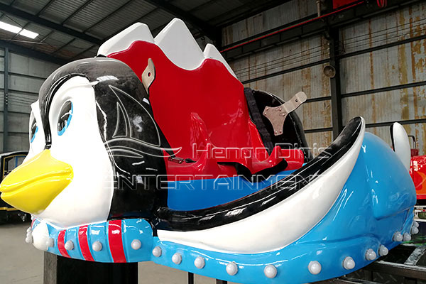 amusement park ride penguin themed roller coaster